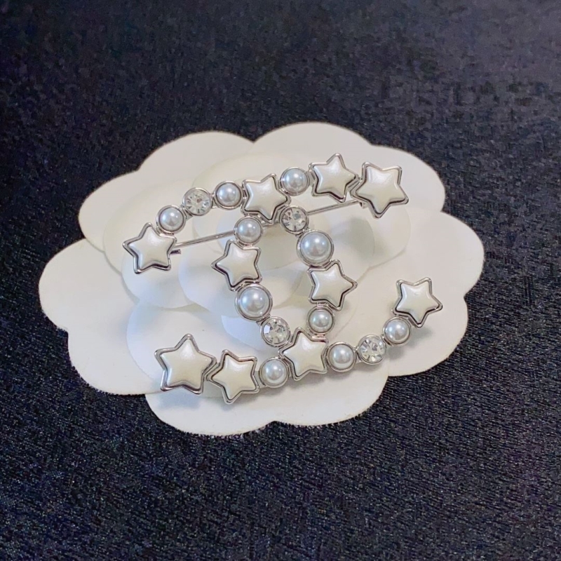Ch**el brooches